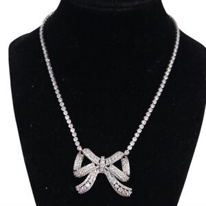 🩶🔹️ Camila Coelho🔹️ Beautiful Cubic Zirconia Silver Necklace with Bow Pendant